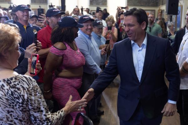 DeSantis greets supporters before speaking during a campaign stop on his Never Back Down South Carolina Bus Tour at The America Legion Post 28 in Spartanburg, South Carolina.